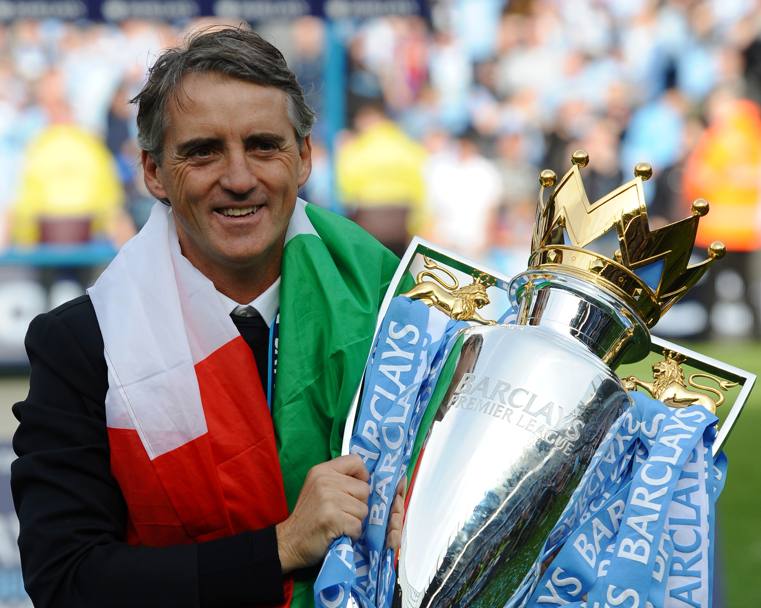 Mancini festeggia la vittoria della Premier League con il Manchester City nel 2012 (Afp)